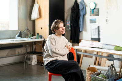 Eva Volmerson sits in her studio.